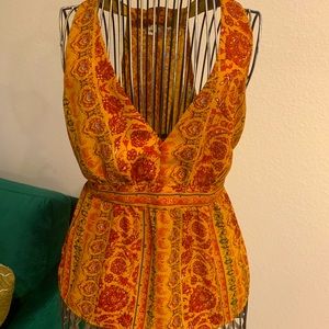 Patterned sleeveless blouse w/ cinched waist sizeM